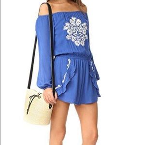 Never worn.  Lovers + friends romper